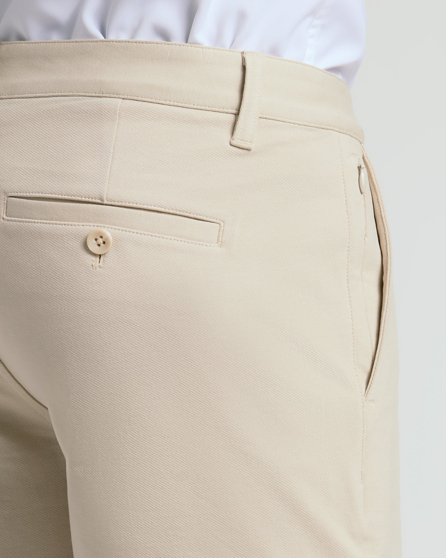 9 Sandstone Chino Shorts 2.0 showing back welt pocket and side pocket.