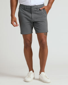 True ClassicThe Standard 7 Chino Shorts 3-Pack worn with white sneakers.