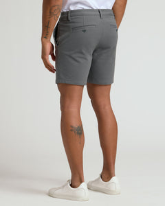 True ClassicBack view of 7 Carbon Chino Shorts 2.0 with tattoos on legs.