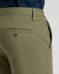 True Classic7 Military Green Classic Chino Shorts showcasing belt loop, zippered pocket, and twill texture.