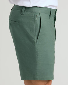 True Classic7 Moss Linen Shorts with side zip pocket and buttoned back pocket.