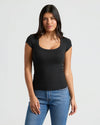 Model wearing Womens Ribbed U-Neck Tee, showcasing its flattering neckline and fit.
