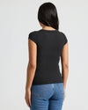 Person wearing Womens Black Ribbed U-Neck Tee with blue jeans.