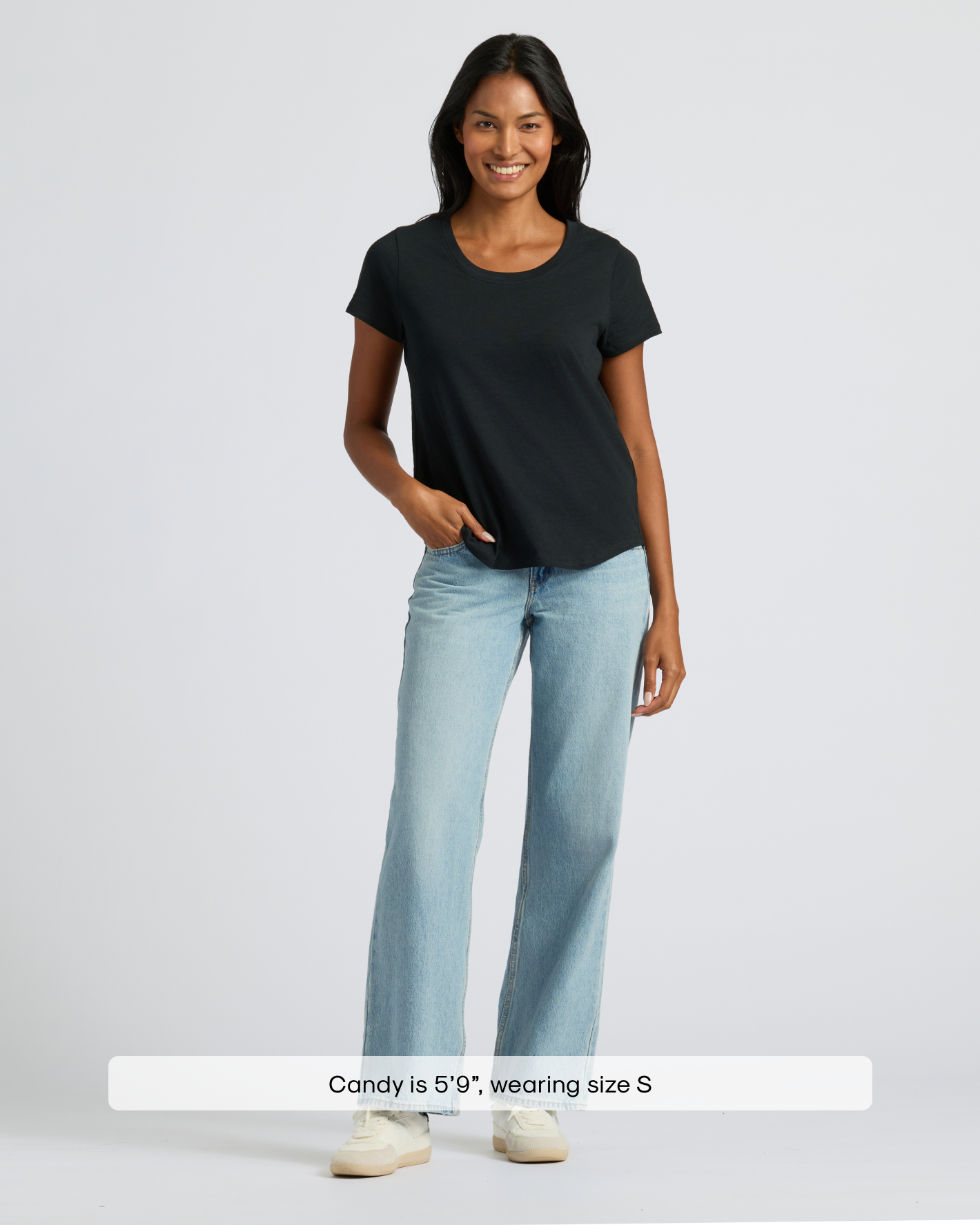 Woman modeling Womens Black Slub Scoop Neck Tee 4-Pack, paired with jeans.