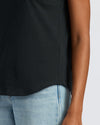Womens Black Slub Scoop Neck Tee 4-Pack with light-wash jeans.