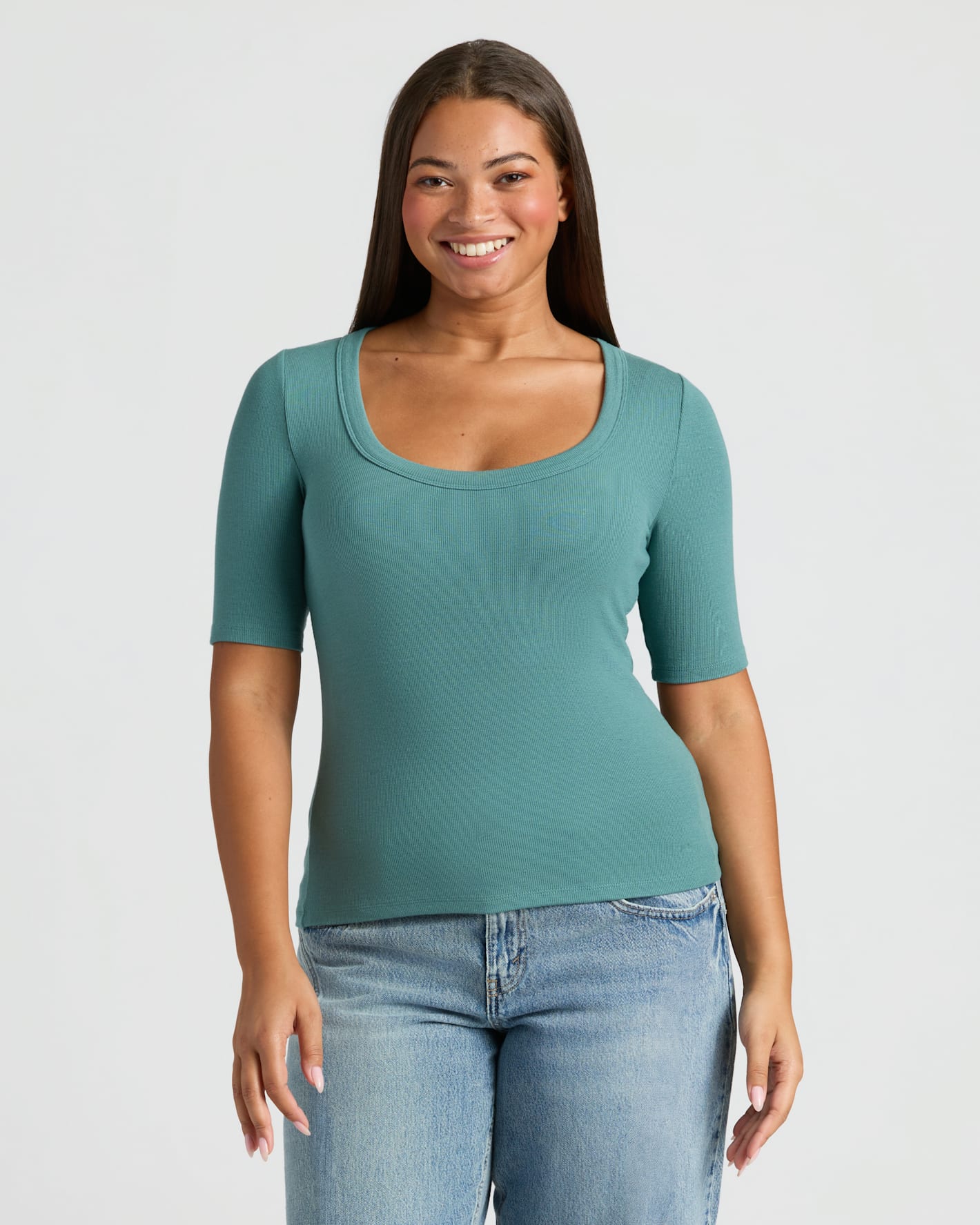 Woman wearing Womens Stormcloud Ribbed 3/4 Sleeve Scoop Neck Tee. MODEL_INFO: Jade is 5'9", wearing a size L