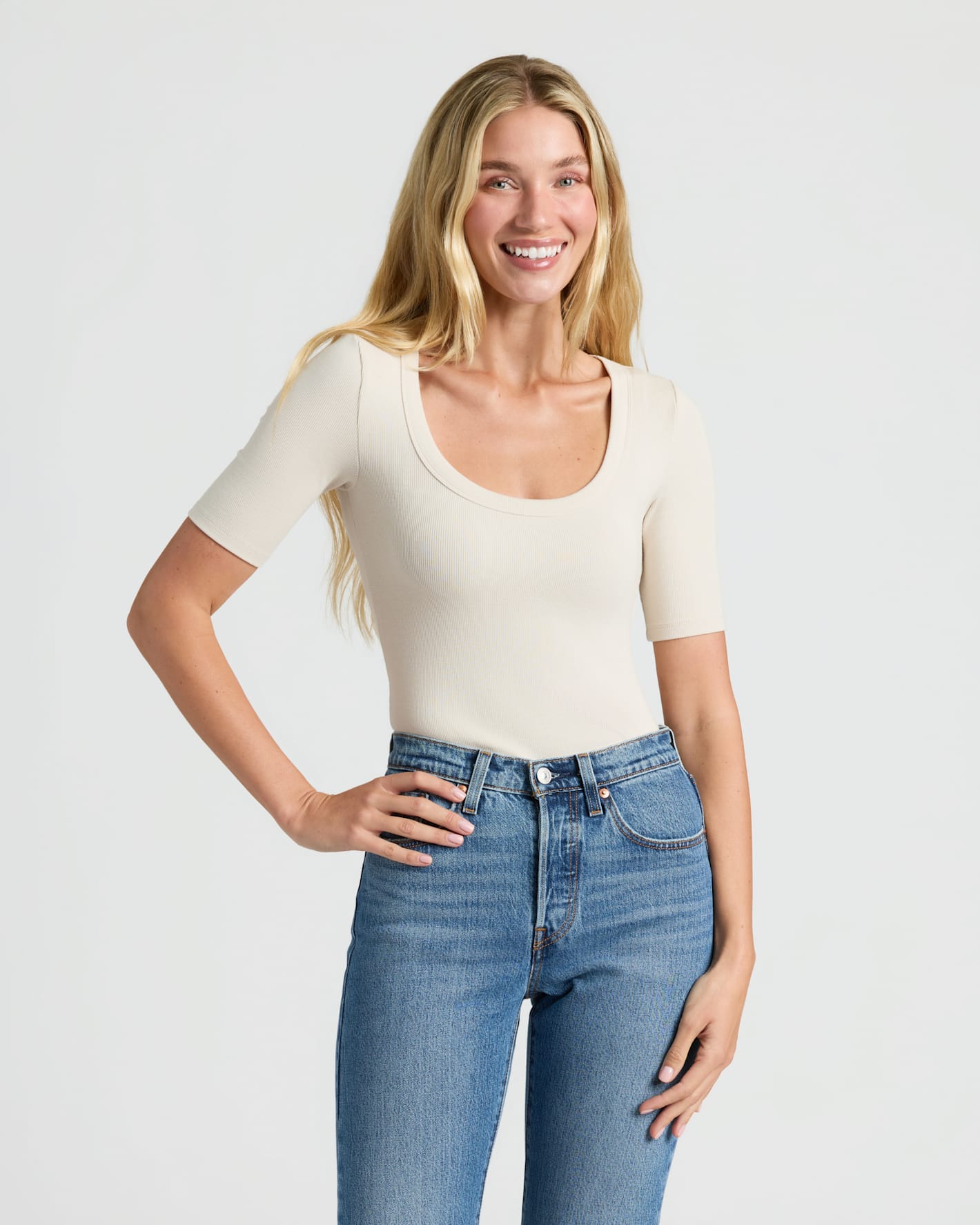 Woman in Womens Ribbed 3/4 Sleeve Scoop Neck Tee 6-Pack. MODEL_INFO: Cora is 5'10", wearing a size S