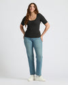 Womens Black Ribbed 3/4 Sleeve Scoop Neck Tee, paired with jeans.