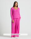 Woman modeling Womens Electric Fuchsia Waffle Long Sleeve Henley & Waffle Leg Pant.