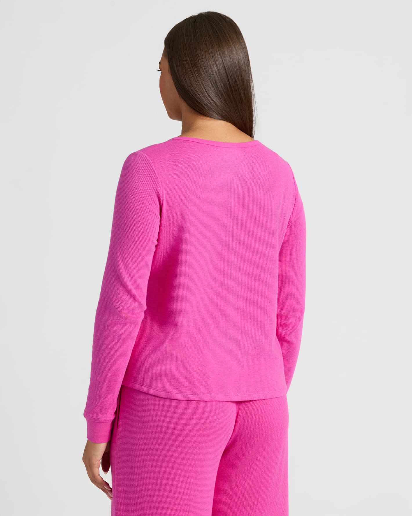 Back view of model in Womens Electric Fuchsia Waffle Long Sleeve Henley & Waffle Leg Pant.