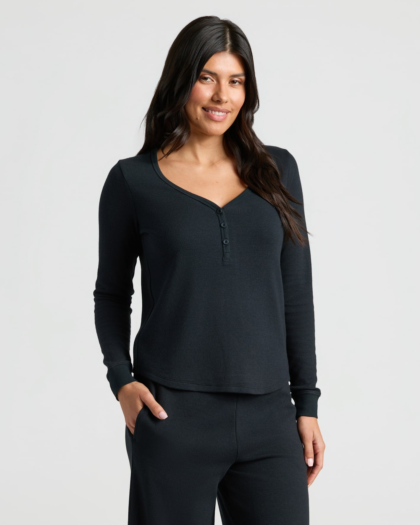Womens Black Waffle Long Sleeve Henley & Waffle Leg Pant 2-Pack worn by model.