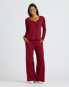 Woman wearing Womens Dark Maroon Waffle Long Sleeve Boxy Henley set.