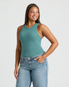Young woman wearing Womens Stormcloud Ribbed High Neck Tank and jeans.