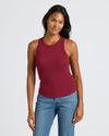 Womens Dark Maroon Ribbed High Neck Tank with mid-wash blue jeans.