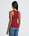 Woman in Women's Ribbed High Neck Tank 3-Pack, burgundy, with jeans.