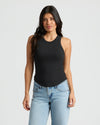 Woman wearing Womens Black Ribbed High Neck Tank 3-Pack with blue jeans.