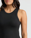 Person wearing Womens Ribbed High Neck Tank, showcasing its sleek, fitted design.
