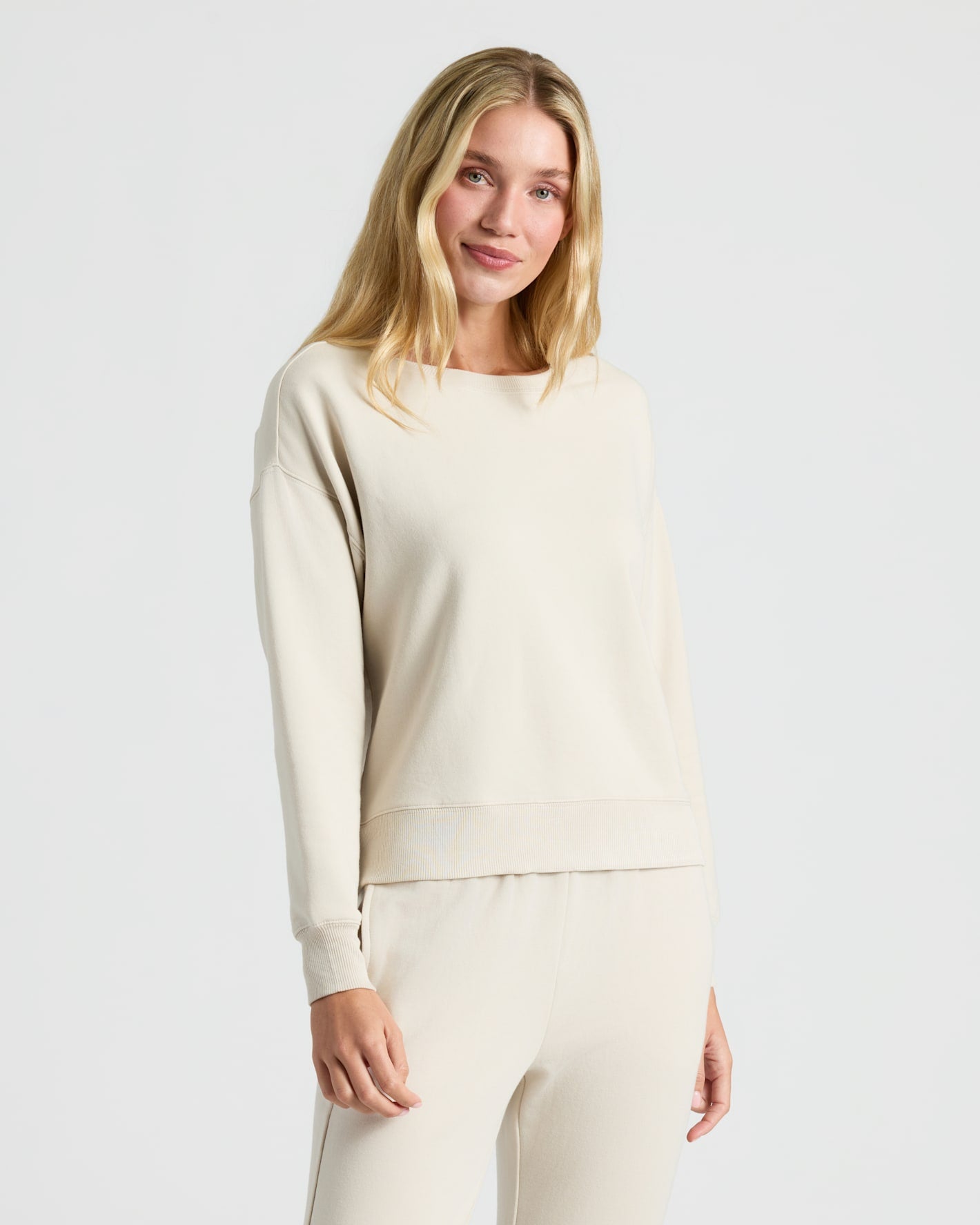 Woman modeling Womens Oatmeal Slouch Pullover Crew & Relaxed Jogger 2-Pack.