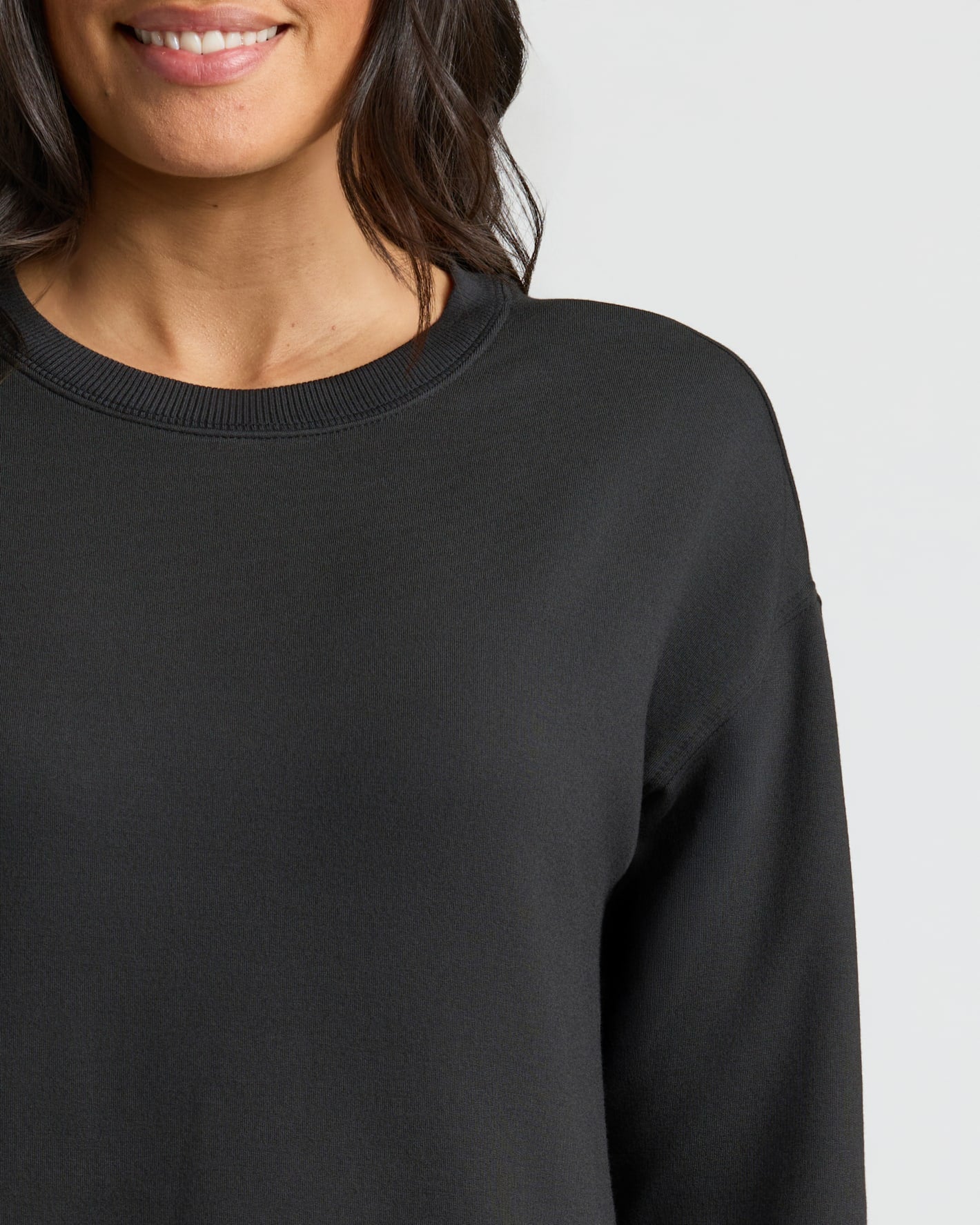 Woman in Womens Black Slouch Pullover Crew from 2-Pack.