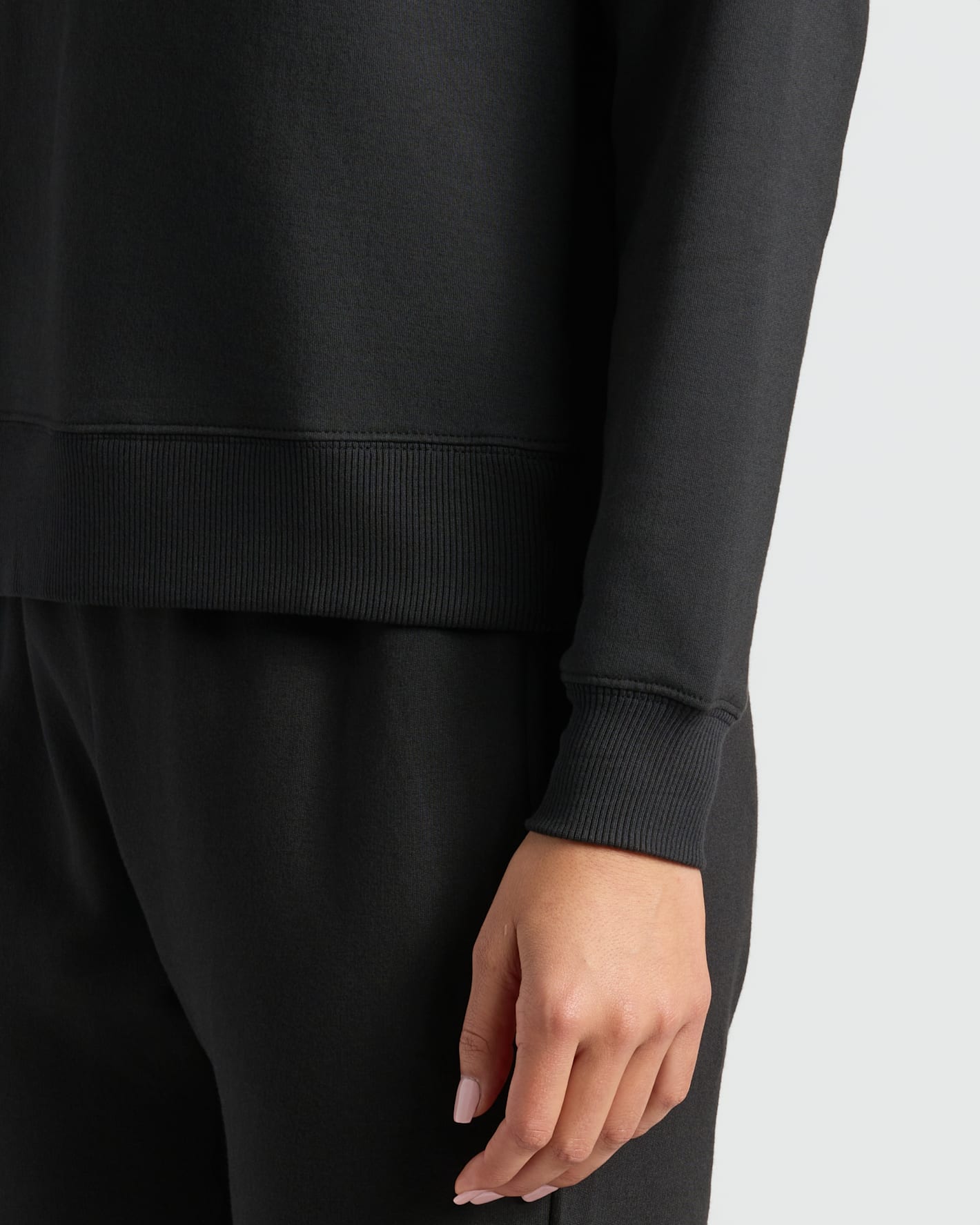 Womens Black Slouch Pullover Crew with ribbed cuff and hem detail.