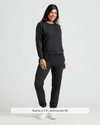 Woman in Womens Black Slouch Pullover Crew & Relaxed Jogger 2-Pack.