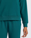 Womens Deep Emerald Slouch Pullover Crew with jogger pants.