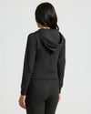 Back view of a woman in Womens Black Crop Zip Hoodie.