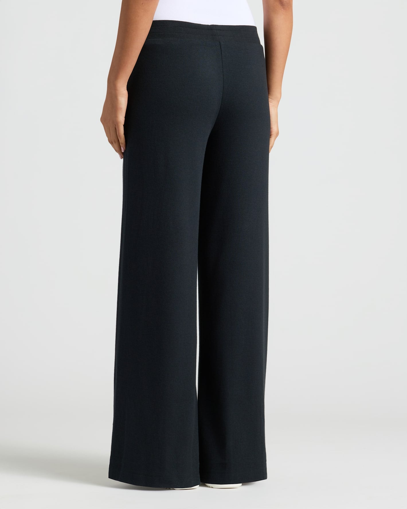 Womens Black Waffle Wide Leg Pants, back view, wide-leg fit.