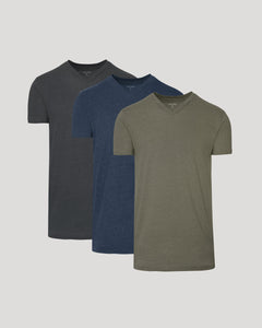 True ClassicThree plain t-shirts in black, blue, and green on a light gray background