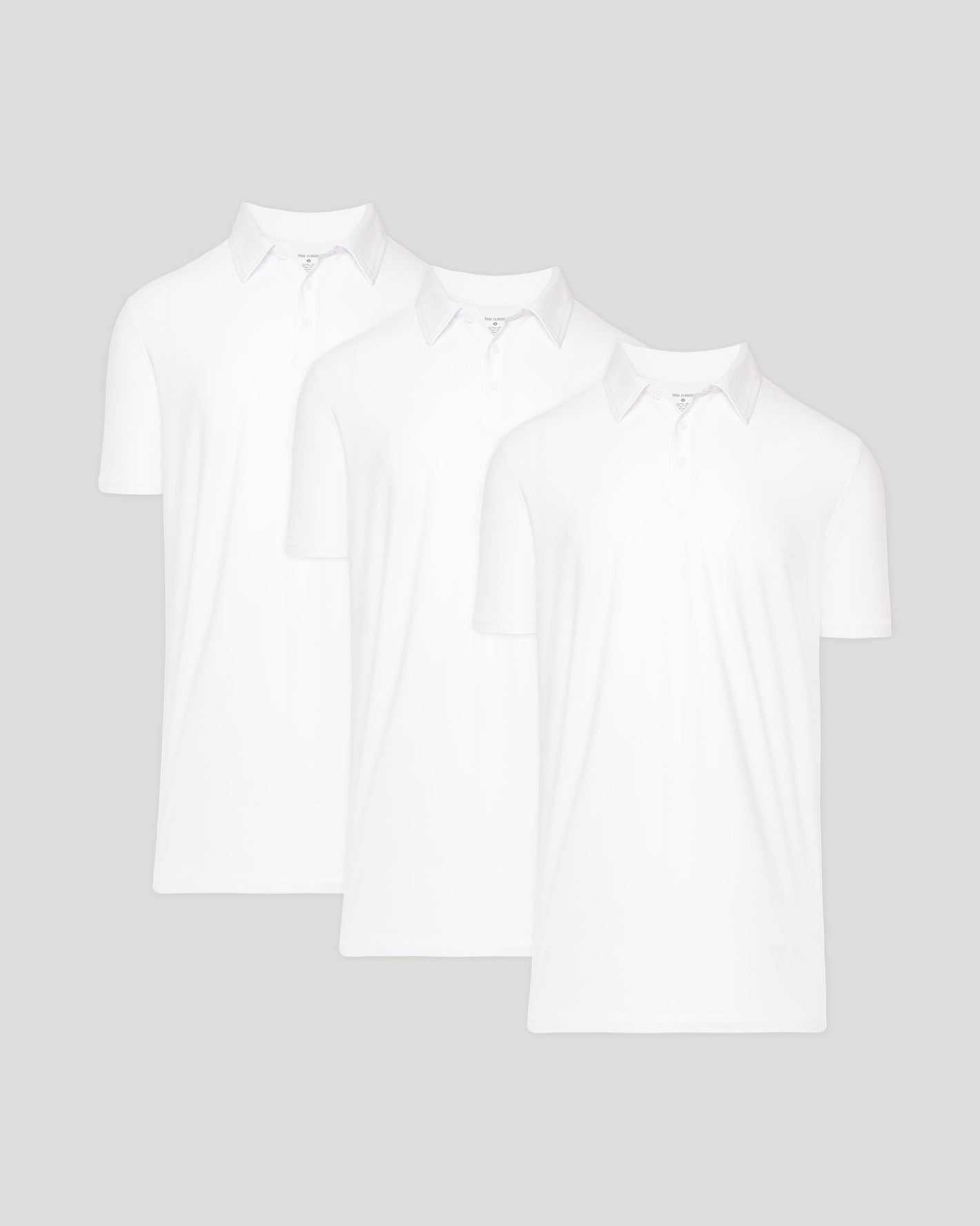 White Tall Active Polo 3-Pack, classic collars, buttoned plackets, overlapping.