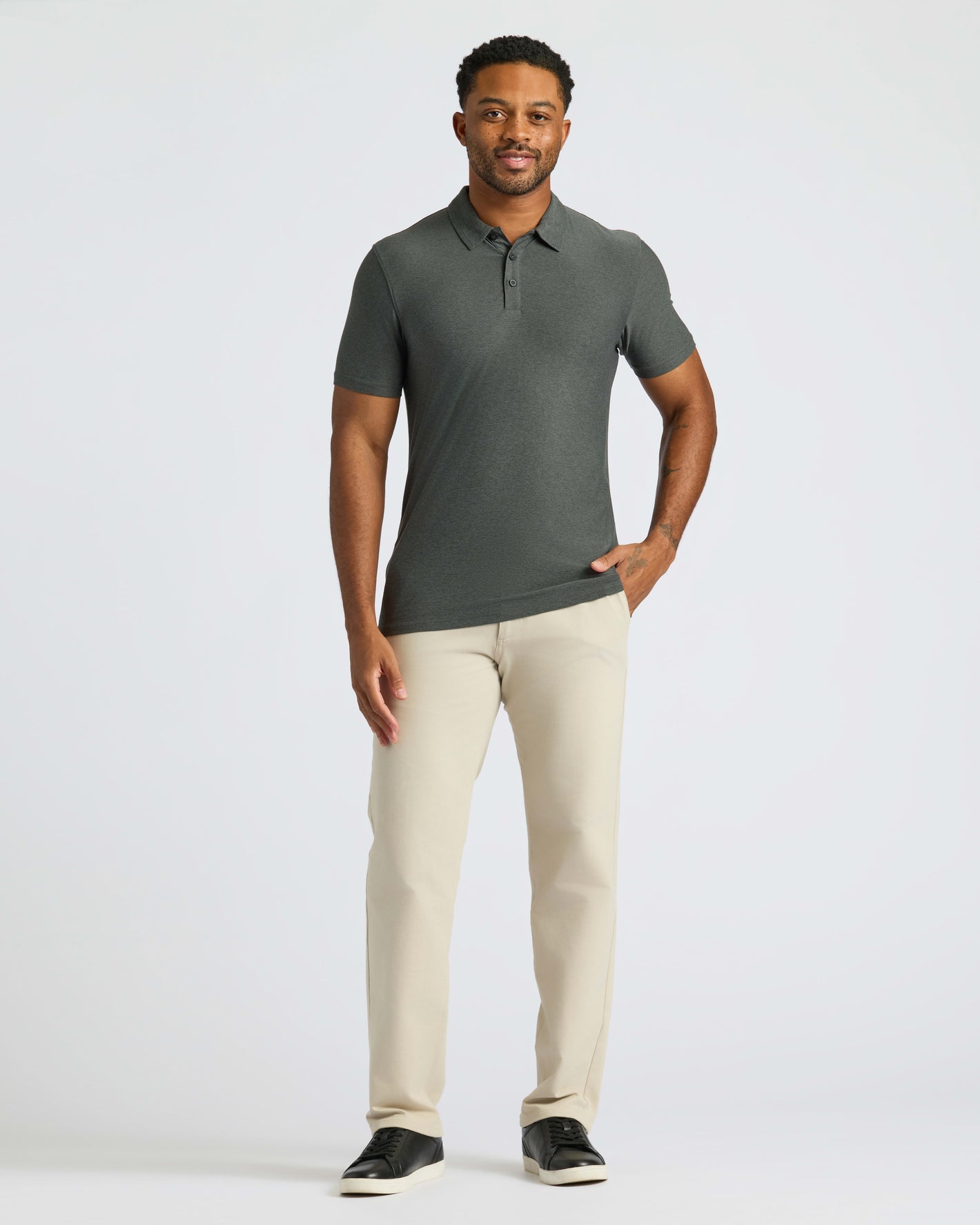 Man wearing Classic Polo with chinos and sneakers.