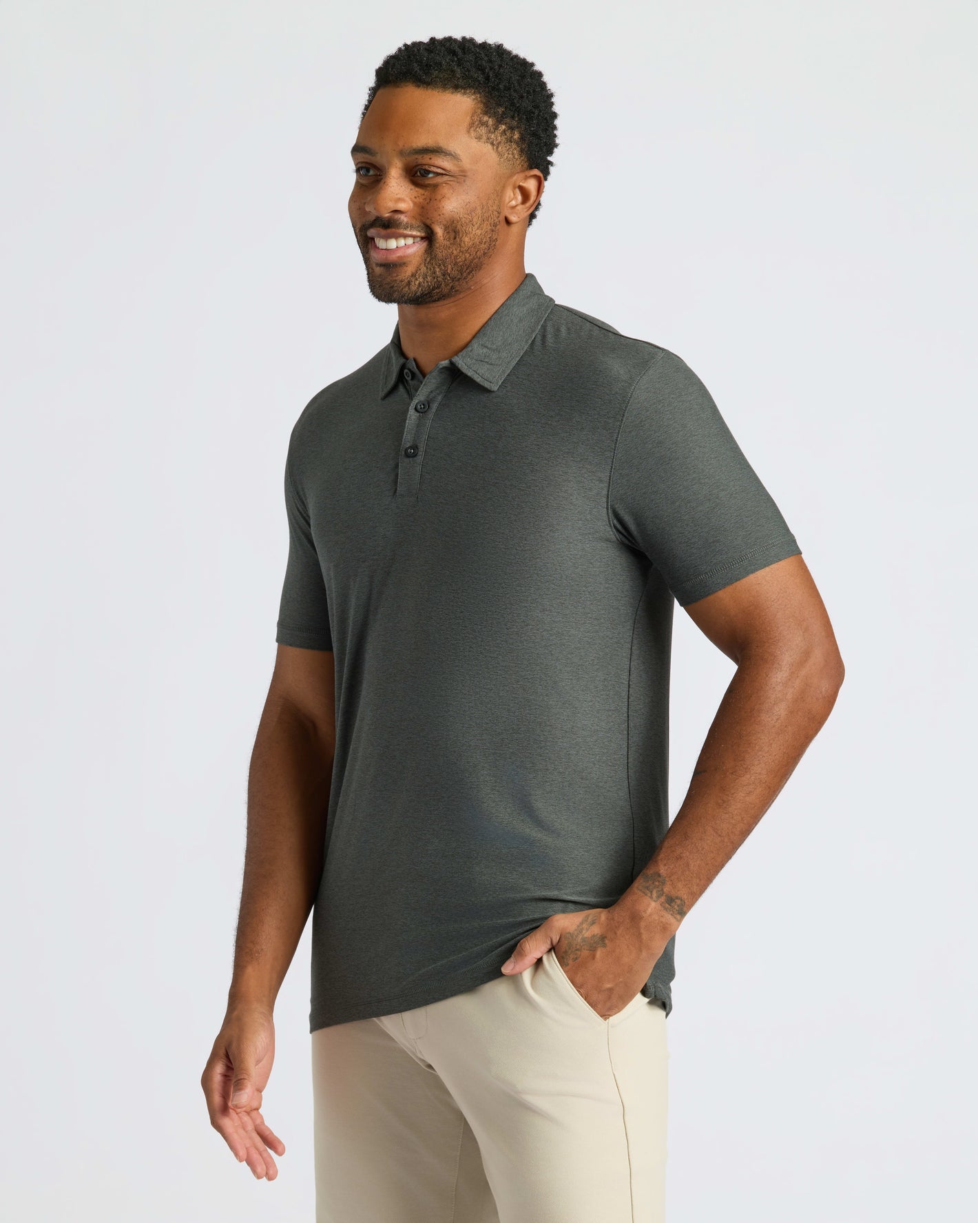 True Classic Men’s Classic Short Sleeve Polo Shirt on model, showcasing premium comfort fit.