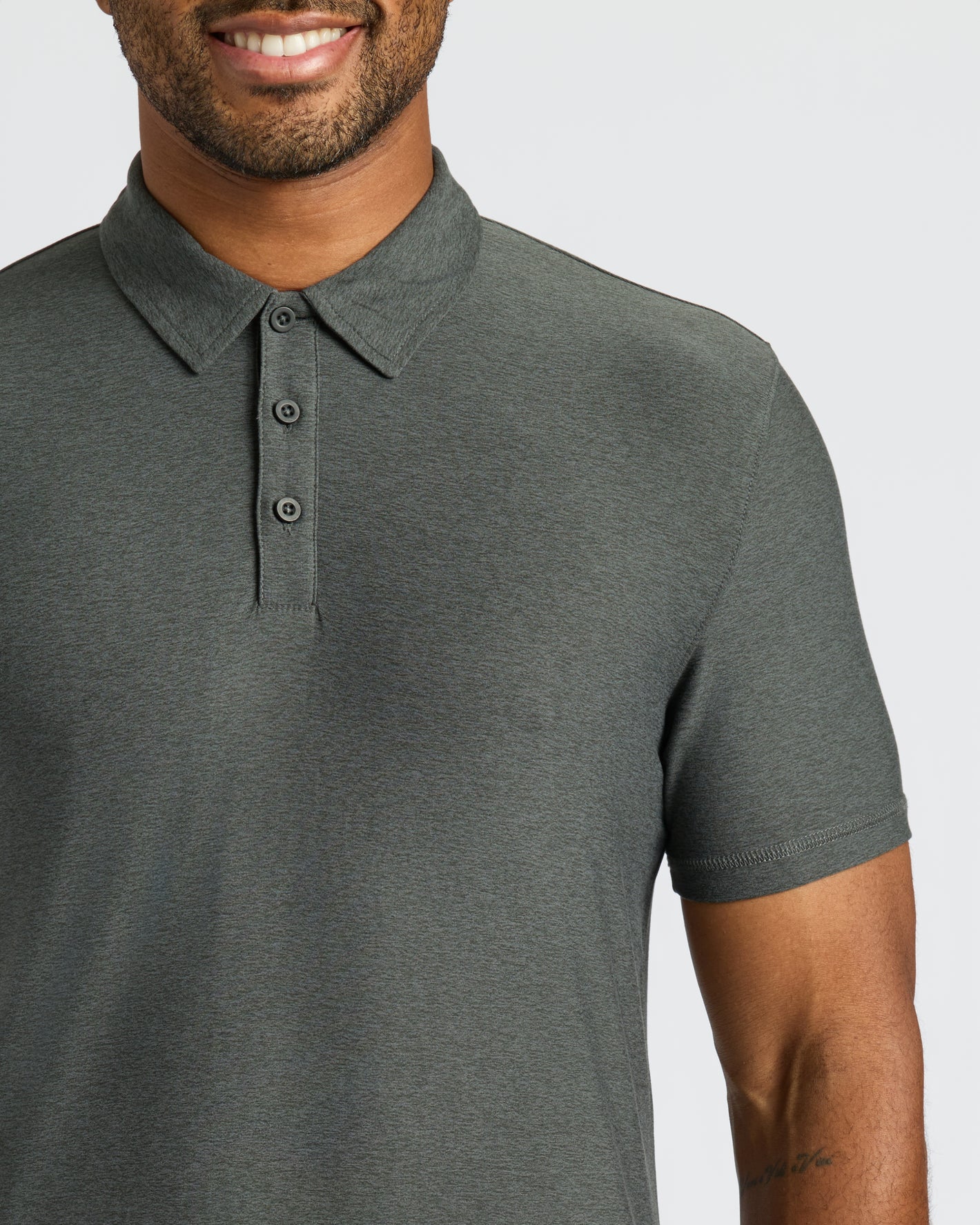 True Classic Men’s Classic Short Sleeve Polo Shirt on smiling man.