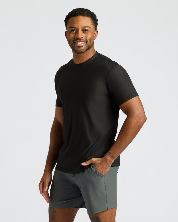 Man in Black Friday Activewear Doorbuster 6-Pack, smiling.