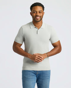 True ClassicMan wearing Classic Polo and jeans, smiling with hands clasped.