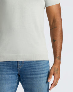 True ClassicPerson wearing Classic Polo with tattoos on visible arm.