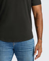 All Black Curved Hem Classic Crew Neck 10-Pack on tattooed arm.