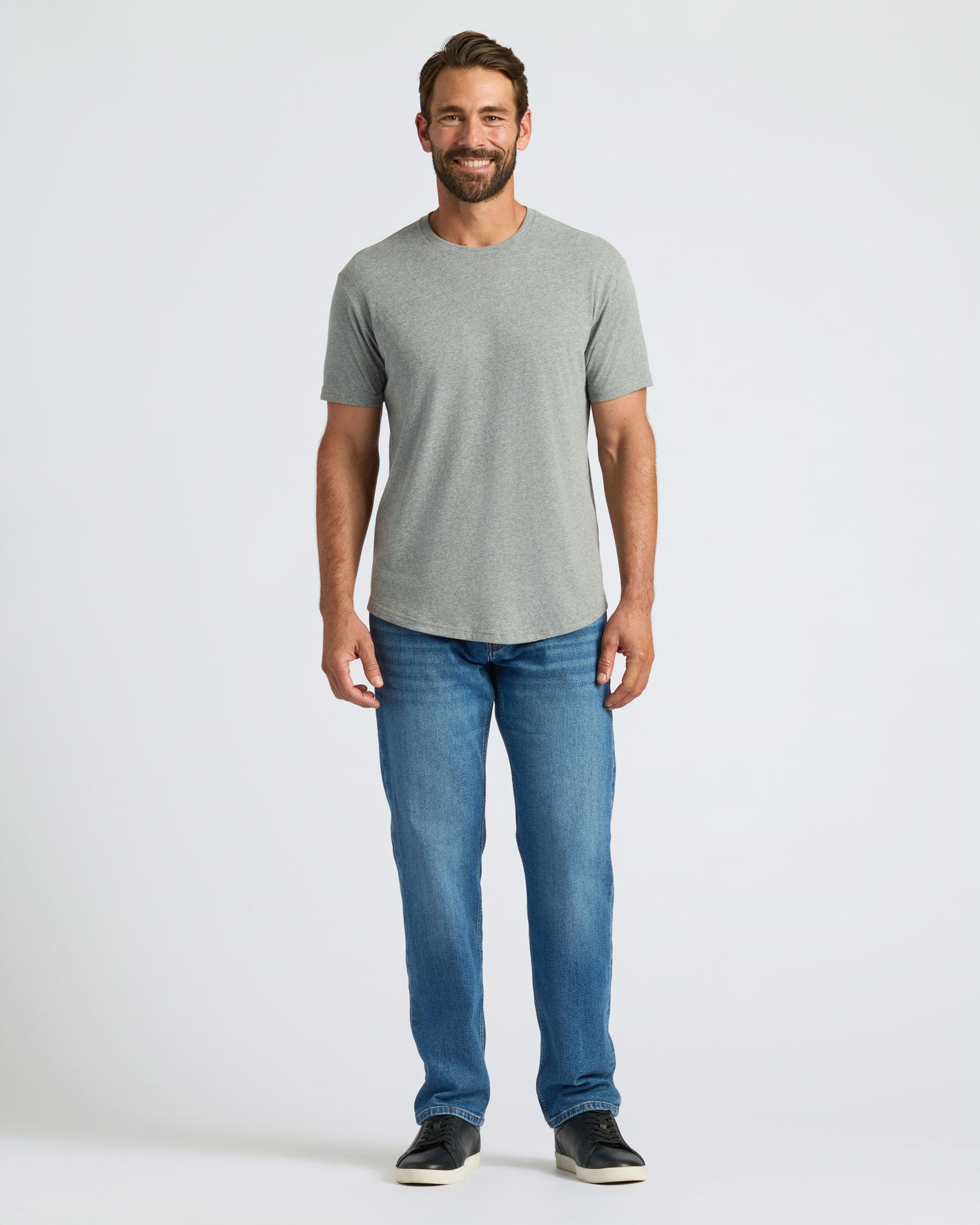 Heather Gray Curved Hem Classic Crew Neck on man, showcasing its tailored fit.