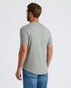 Man wearing Heather Gray Curved Hem Classic Crew Neck T-shirt.