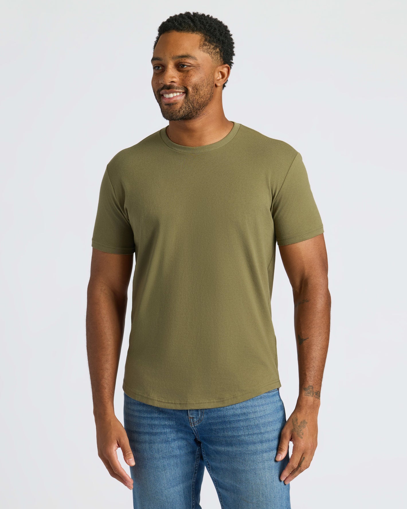 Military Green Curved Hem Classic Crew Neck on male model with tattoos.