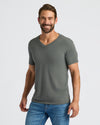 Model wearing Classic V-Neck 10-Pack, gray-green tee, blue jeans.