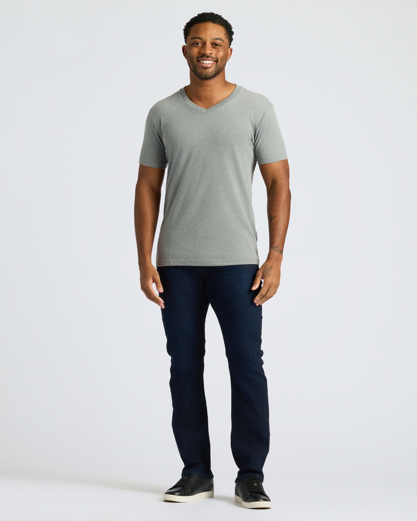 Man wearing True Classic Men’s V-Neck T Shirt, showcasing modern fit.