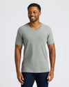 True Classic Men’s V-Neck T Shirt on smiling man with tattoos.