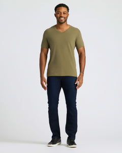 True ClassicMan wearing Classic V-Neck, slim-fit jeans, and sneakers.