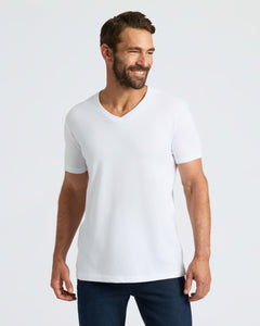 True ClassicMan wearing Classic V-Neck T-shirt, smiling and looking sideways.