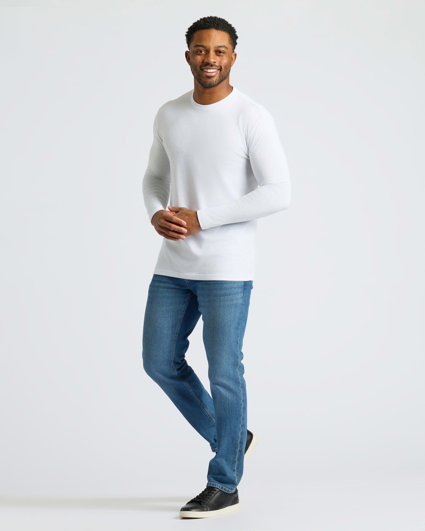Man in All White Long Sleeve Crew Neck from 3-Pack.