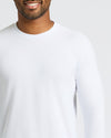 Man wearing All White Long Sleeve Crew Neck from 3-Pack, smiling.