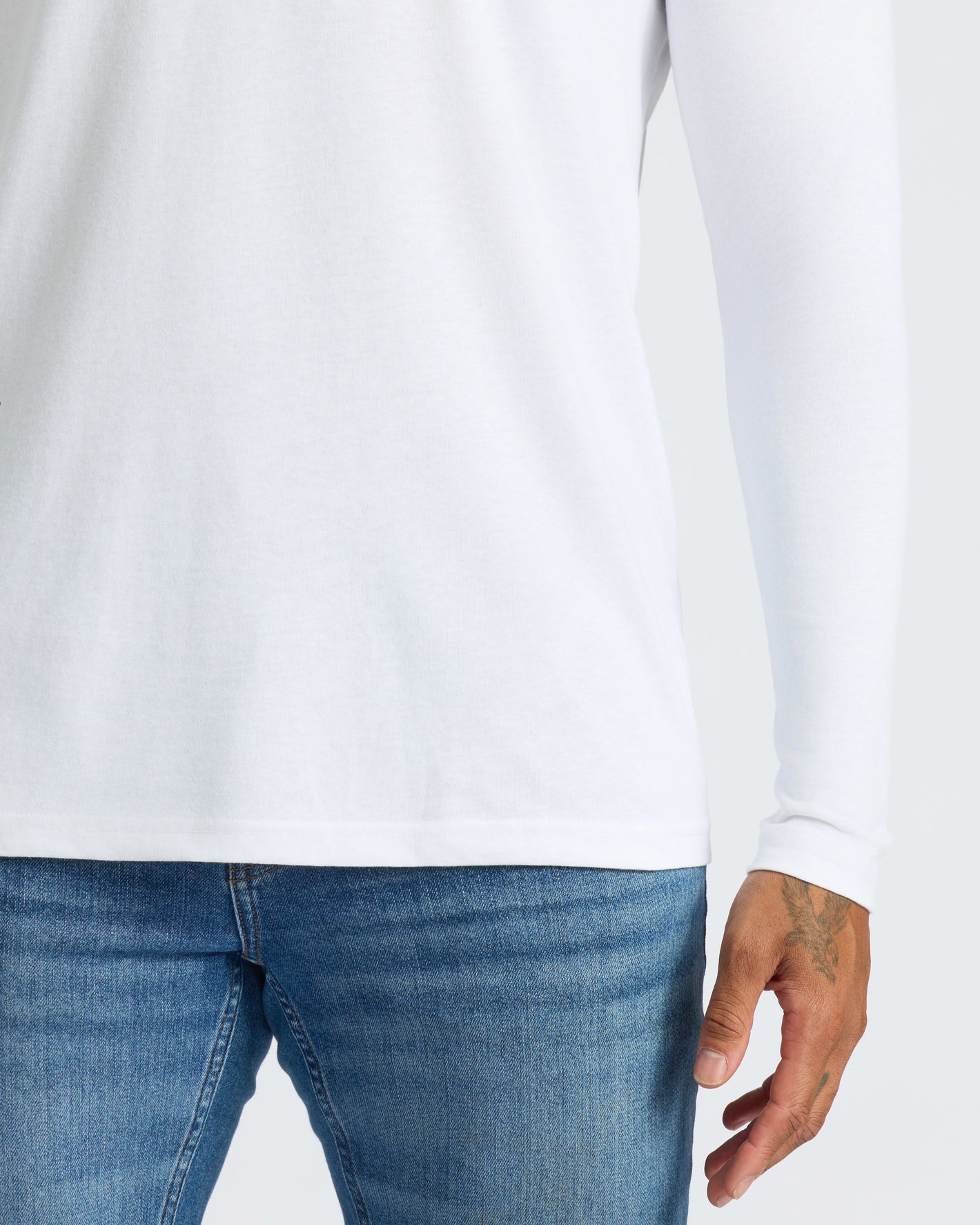 All White Long Sleeve Crew Neck 3-Pack worn casually.