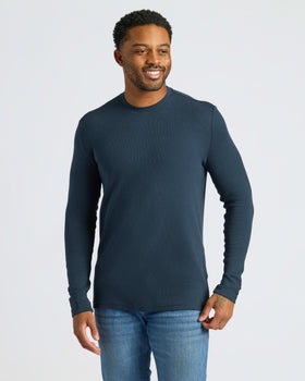 Man in Navy Waffle Long Sleeve Crew Neck and jeans.
