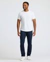 Man wearing Medium Gray Wash Slim Comfort Stretch Jeans.